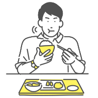 障がい者グループホームで食事をする入居者の様子